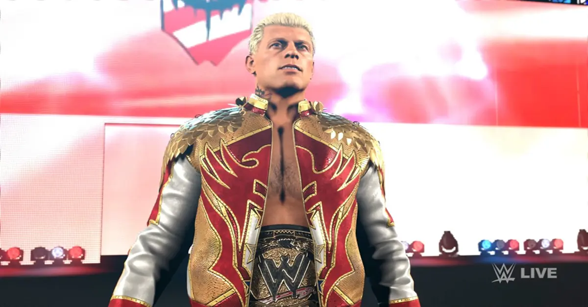 Cody Rhodes debout sur le ring entouré de pyrotechnie dans WWE 2K26